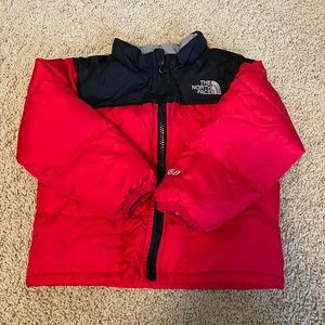 North Face red and black puffer jacket